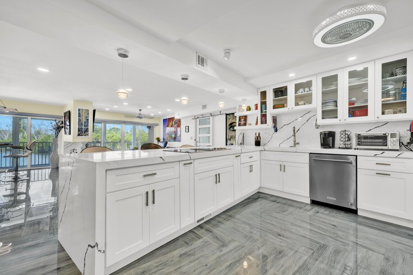One of the finest three-bedroom waterfront residences in - photo 12