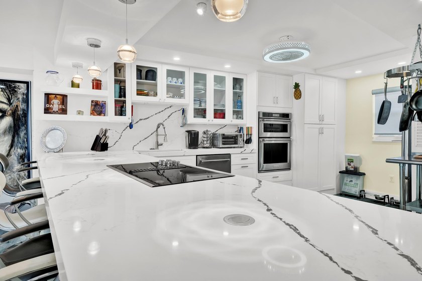 One of the finest three-bedroom waterfront residences in - photo 13