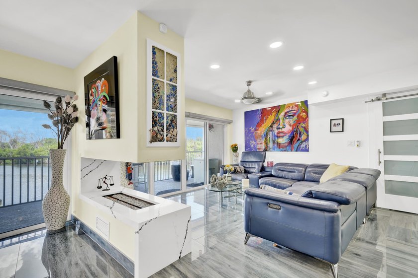 One of the finest three-bedroom waterfront residences in - photo 14