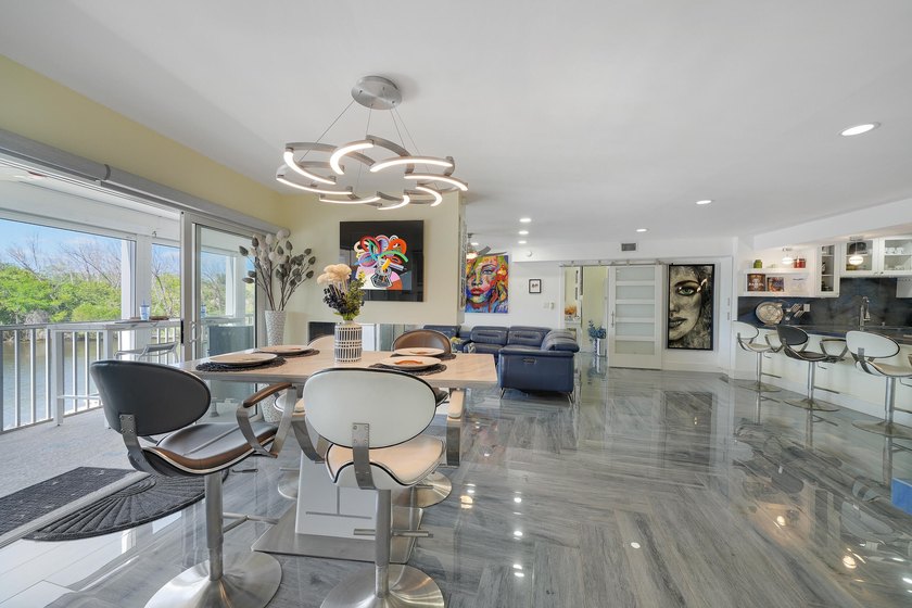One of the finest three-bedroom waterfront residences in - photo 18