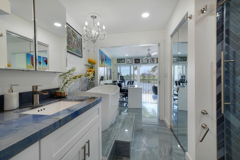 One of the finest three-bedroom waterfront residences in - photo 23