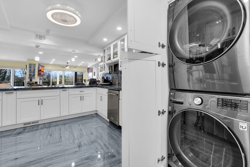 One of the finest three-bedroom waterfront residences in - photo 30