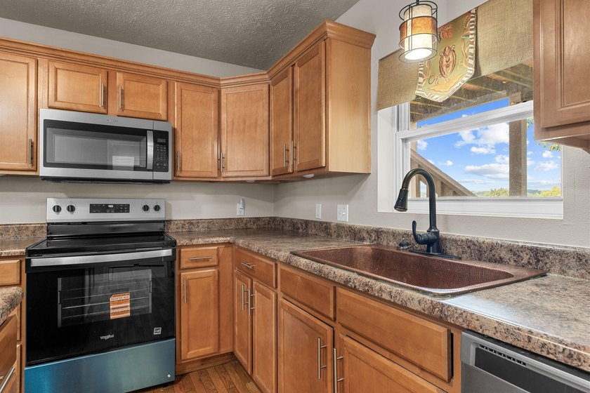 Discover the perfect blend of space, comfort, and lake living in - photo 8