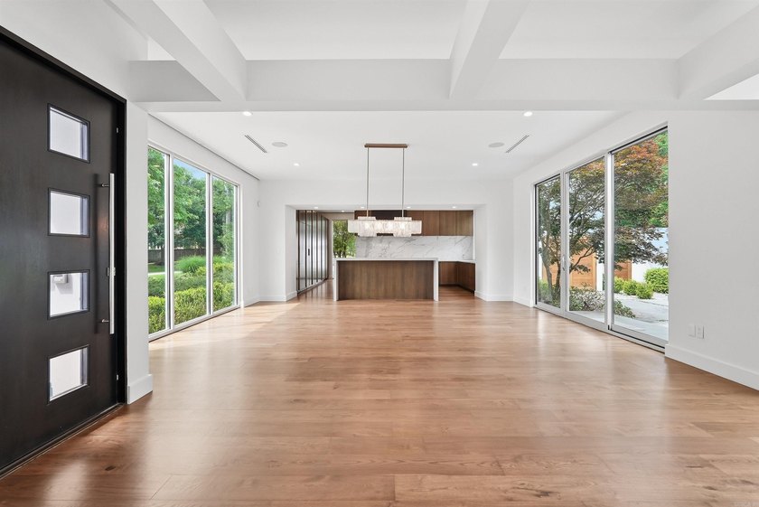 An extraordinary one-level estate in the prestigious gated - photo 12