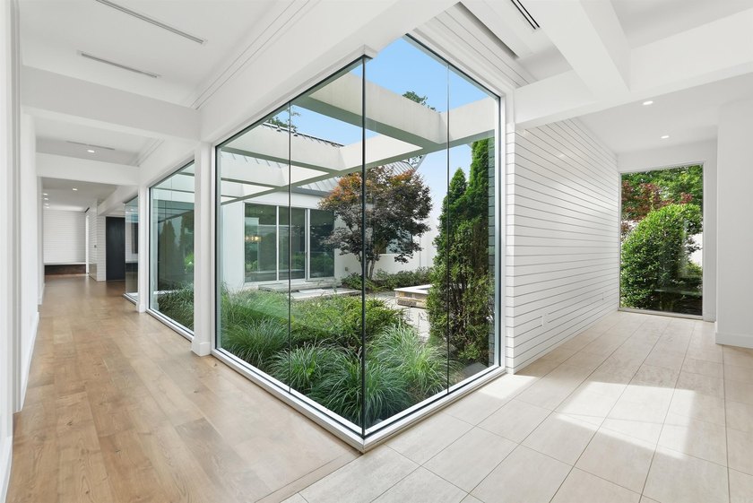 An extraordinary one-level estate in the prestigious gated - photo 23