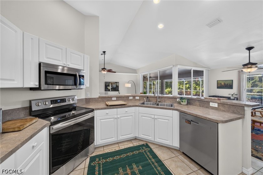 Situated on an oversized THREE-LOT SITE (0.34 acres) in the - photo 8