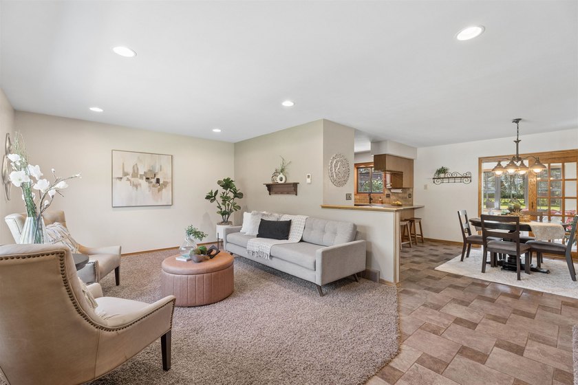 Nestled on over 1/2 acre, this well-maintained home is tucked - photo 3