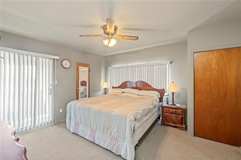 This spacious 3-story home in Gerritsen Beach sits on a double - photo 22