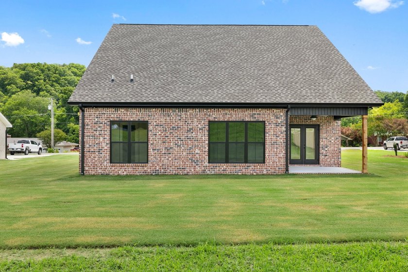Welcome to this charming cottage-style new construction in the - photo 5