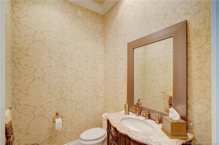 Welcome to this stunning Tuscan-inspired estate featuring an - photo 12