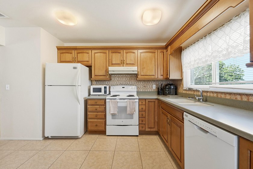 Bright and airy 3-bedroom, 2 full bath home situated on a rare - photo 14