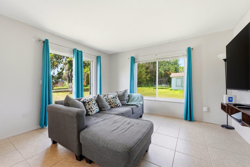 Bright and airy 3-bedroom, 2 full bath home situated on a rare - photo 17