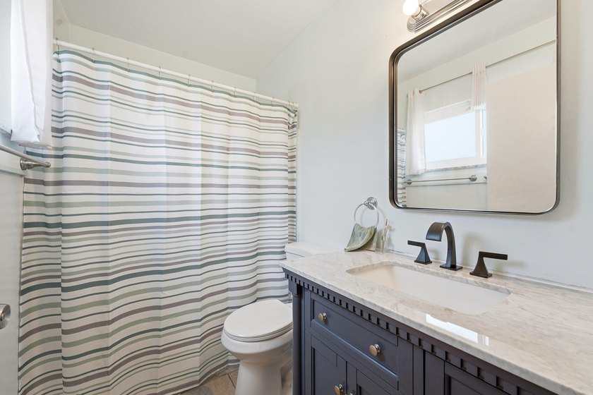 Bright and airy 3-bedroom, 2 full bath home situated on a rare - photo 24