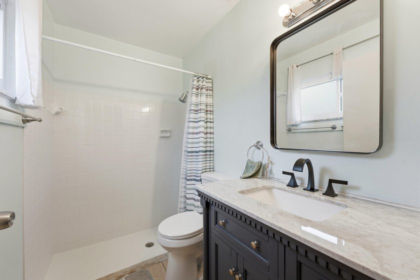 Bright and airy 3-bedroom, 2 full bath home situated on a rare - photo 25