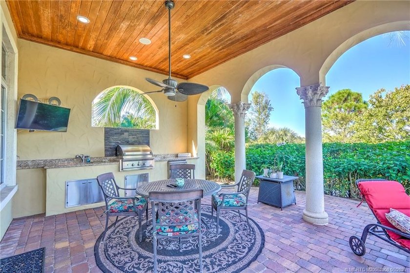 Welcome to this stunning Tuscan-inspired estate featuring an - photo 32