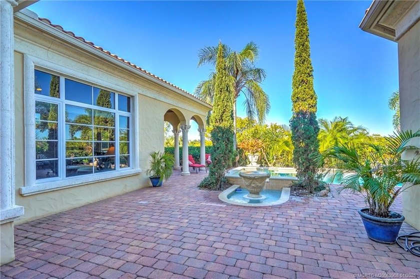 Welcome to this stunning Tuscan-inspired estate featuring an - photo 34
