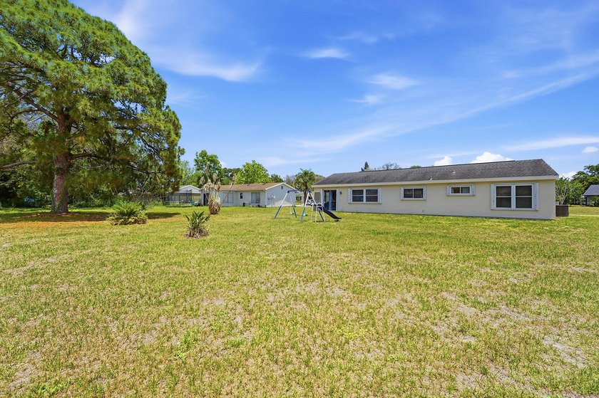 Bright and airy 3-bedroom, 2 full bath home situated on a rare - photo 34