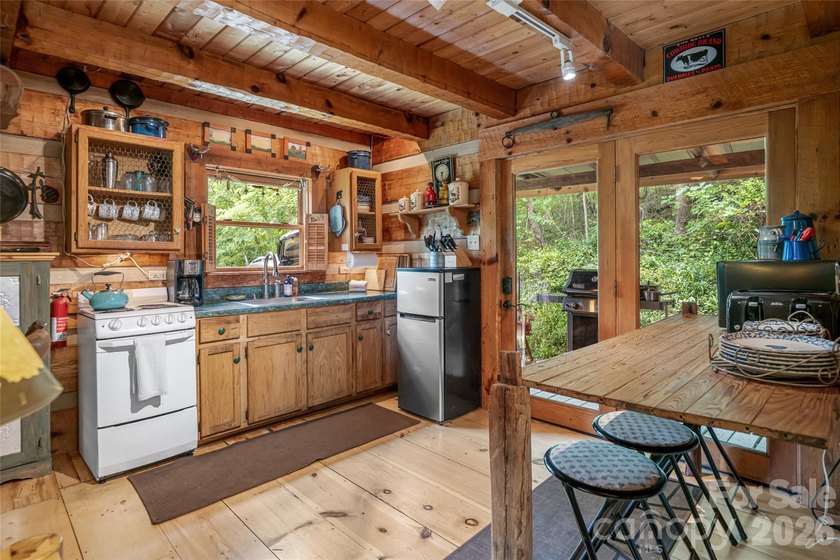 Hand-Hewn Craftsmanship. River Views. A True Mountain Escape - photo 13