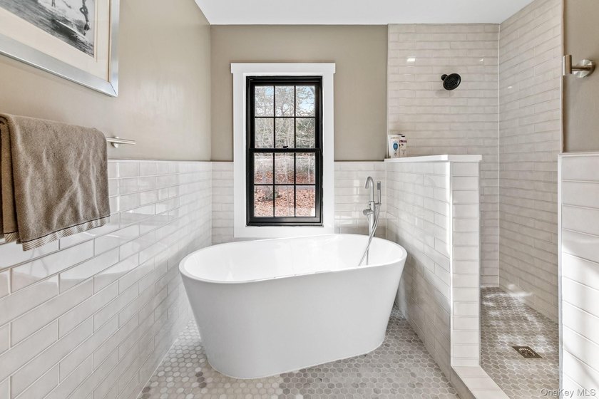 This exquisitely updated home is situated at the end of a - photo 27