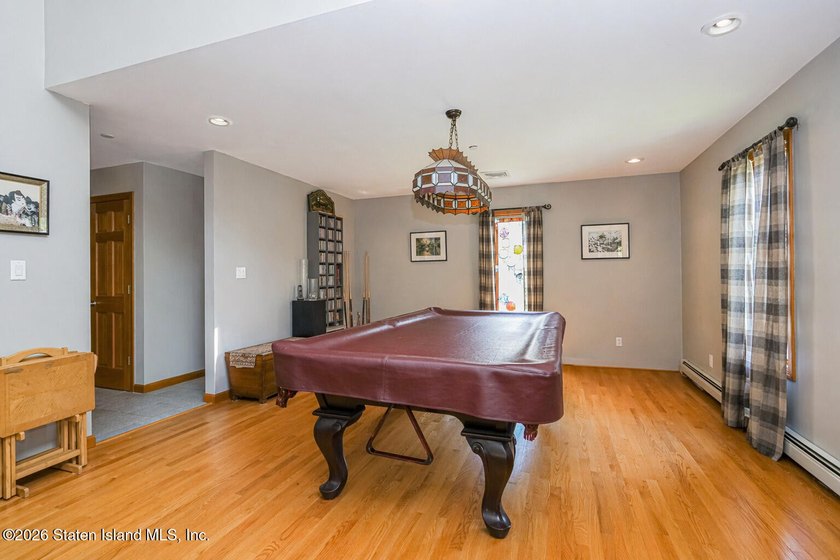 Welcome to this stunning 2-family colonial tucked away on a - photo 13