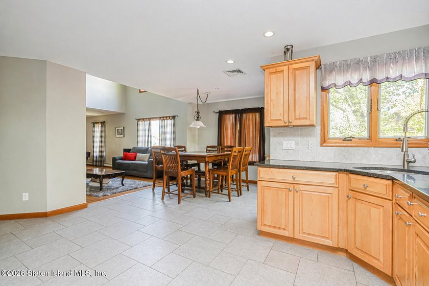 Welcome to this stunning 2-family colonial tucked away on a - photo 16