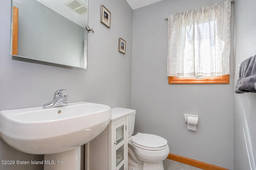 Welcome to this stunning 2-family colonial tucked away on a - photo 17