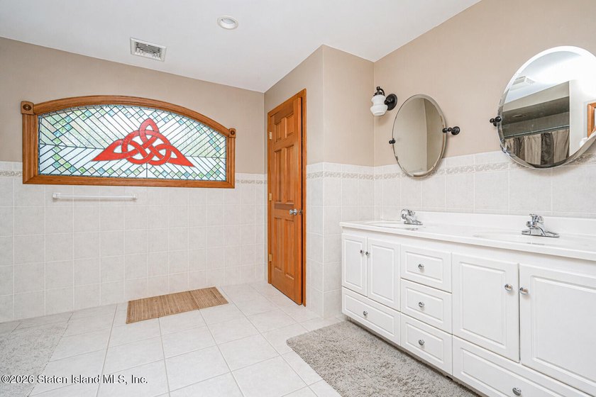 Welcome to this stunning 2-family colonial tucked away on a - photo 23