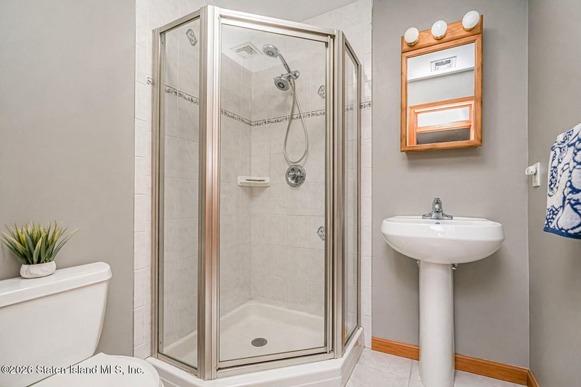 Welcome to this stunning 2-family colonial tucked away on a - photo 24