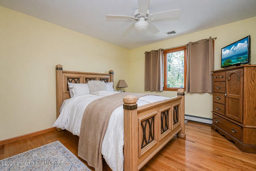 Welcome to this stunning 2-family colonial tucked away on a - photo 27