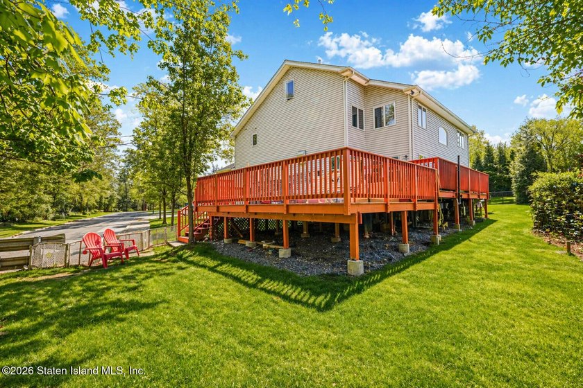 Welcome to this stunning 2-family colonial tucked away on a - photo 40