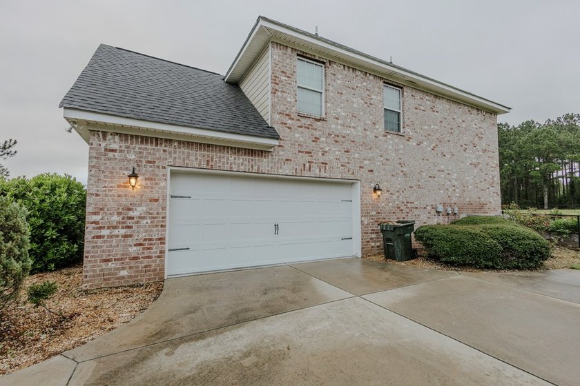 Welcome home to this stunning, light-filled brick residence - photo 3