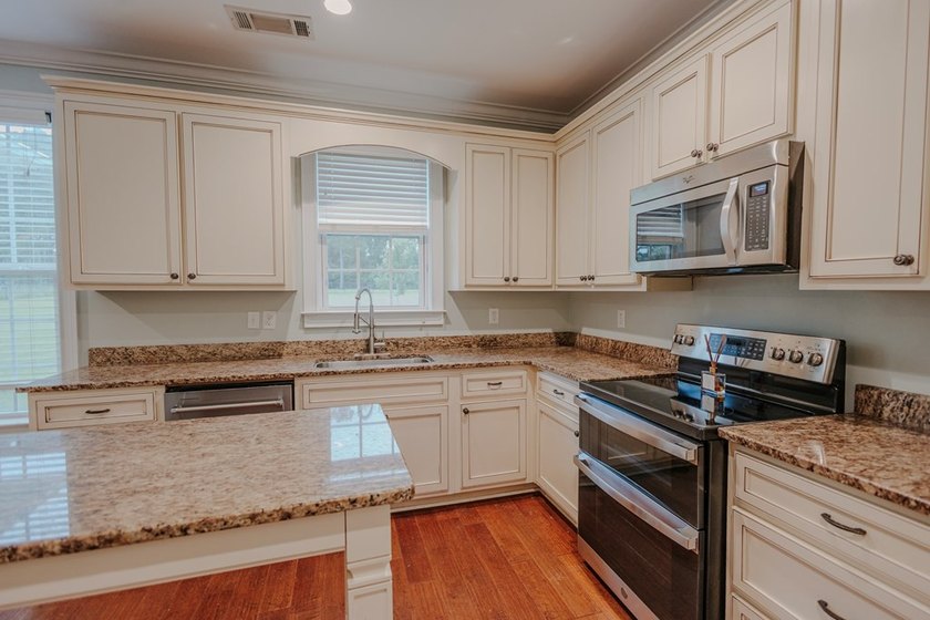 Welcome home to this stunning, light-filled brick residence - photo 6