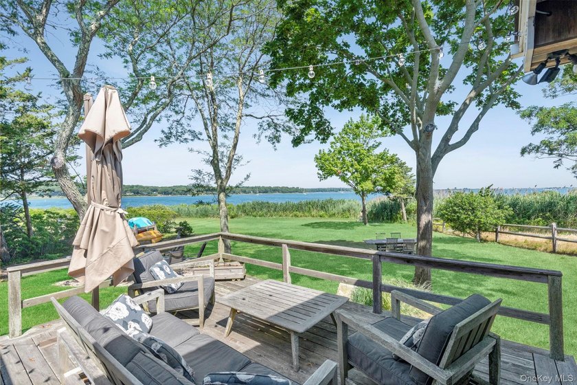 Enjoy breathtaking western-facing views across Three Mile Harbor - photo 14