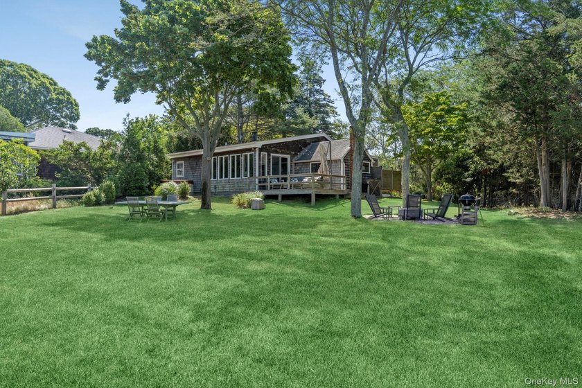 Enjoy breathtaking western-facing views across Three Mile Harbor - photo 16
