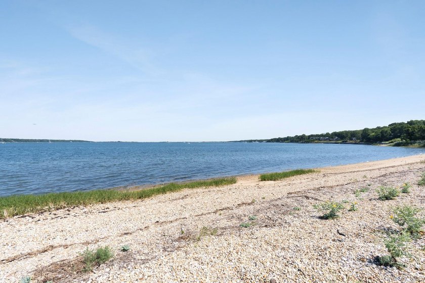 Enjoy breathtaking western-facing views across Three Mile Harbor - photo 18