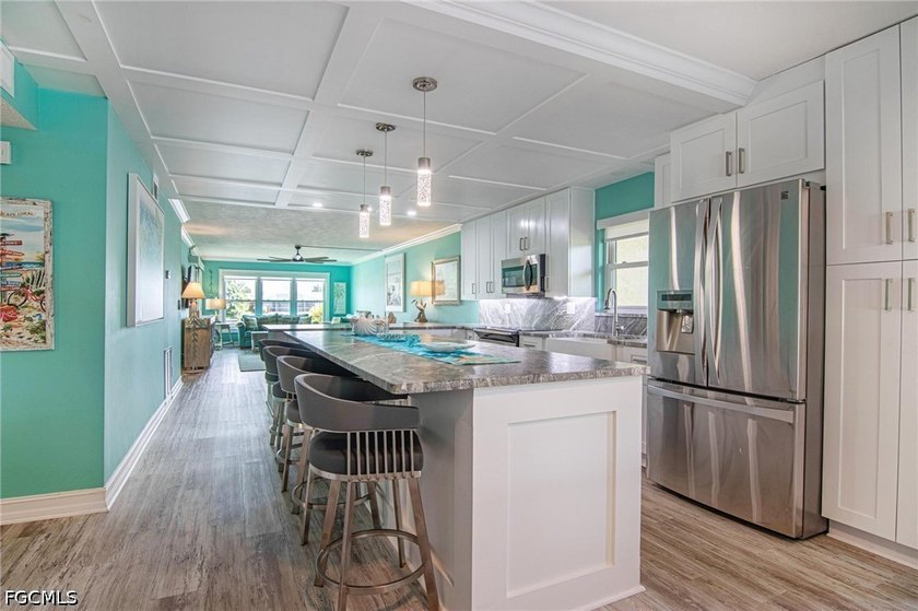 Fully renovated and move-in ready, this stunning first-floor - photo 3