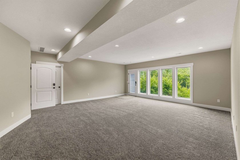 Welcome to this stunning 3-bedroom, 2.5-bath, reverse 1.5 ranch - photo 36