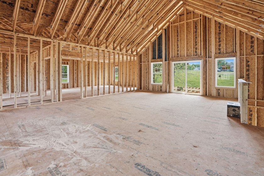 Quality new construction on a beautiful 1.7-acre corner lot! - photo 7