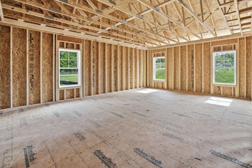 Quality new construction on a beautiful 1.7-acre corner lot! - photo 9