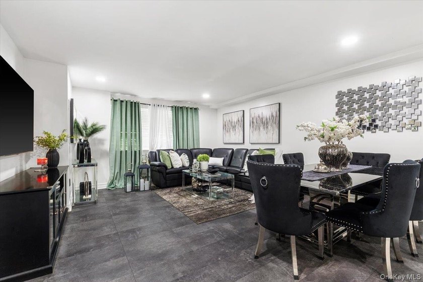 Welcome to this well-maintained three-family home in the Bronx - photo 3