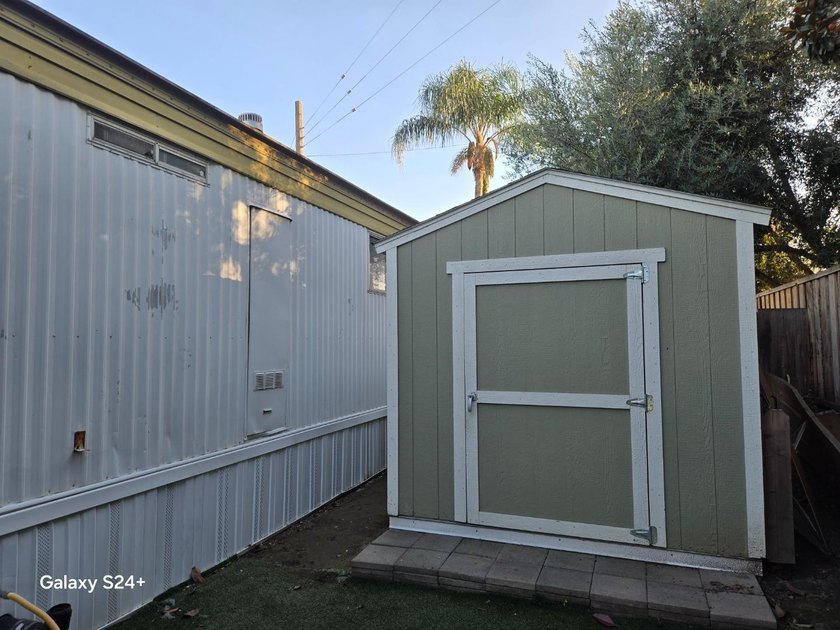 2 bedroom, 1 bathroom mobile home with an expando. Located in - photo 9
