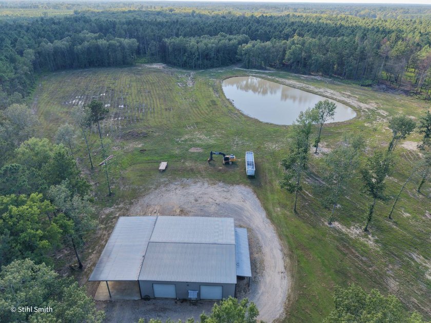 Home with a massive shop, two ponds, and plenty of privacy - photo 14