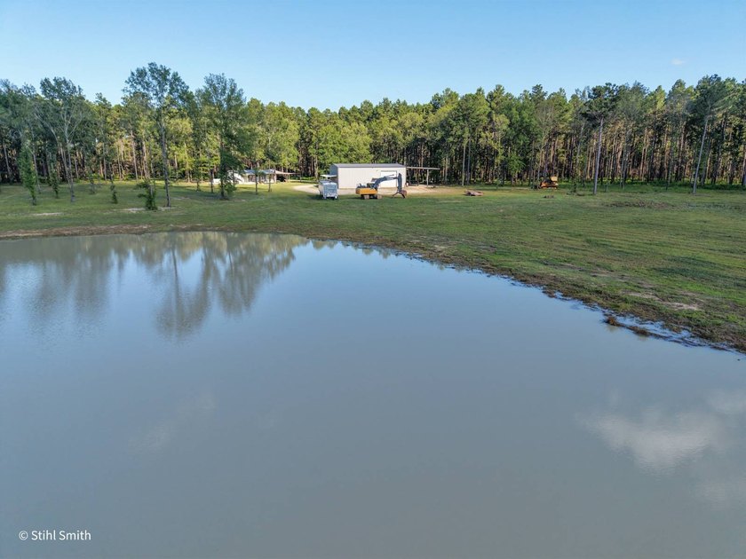 Home with a massive shop, two ponds, and plenty of privacy - photo 15