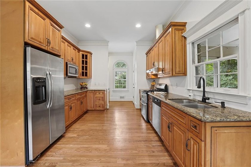Tucked away in a great family neighborhood, this solid, handsome - photo 13