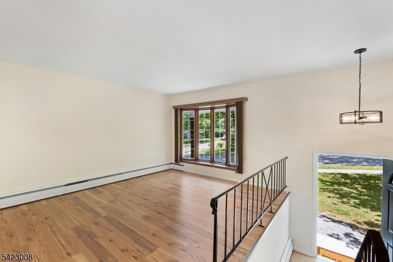 Welcome to this newly renovated bilevel, positioned perfectly on - photo 8