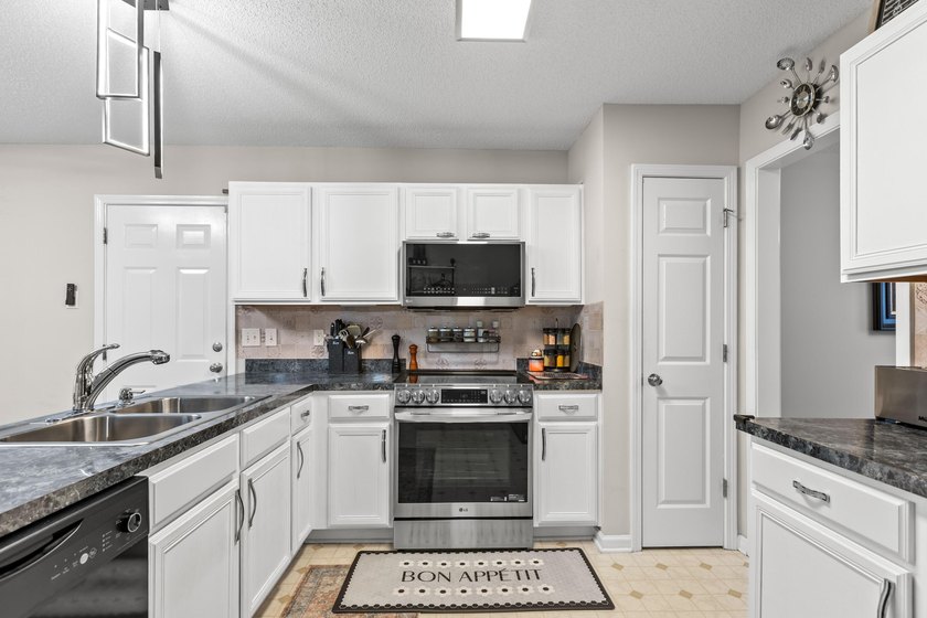 Spacious 4BR/2.5BA home in Park Hill Place offering nearly 2,400 - photo 3