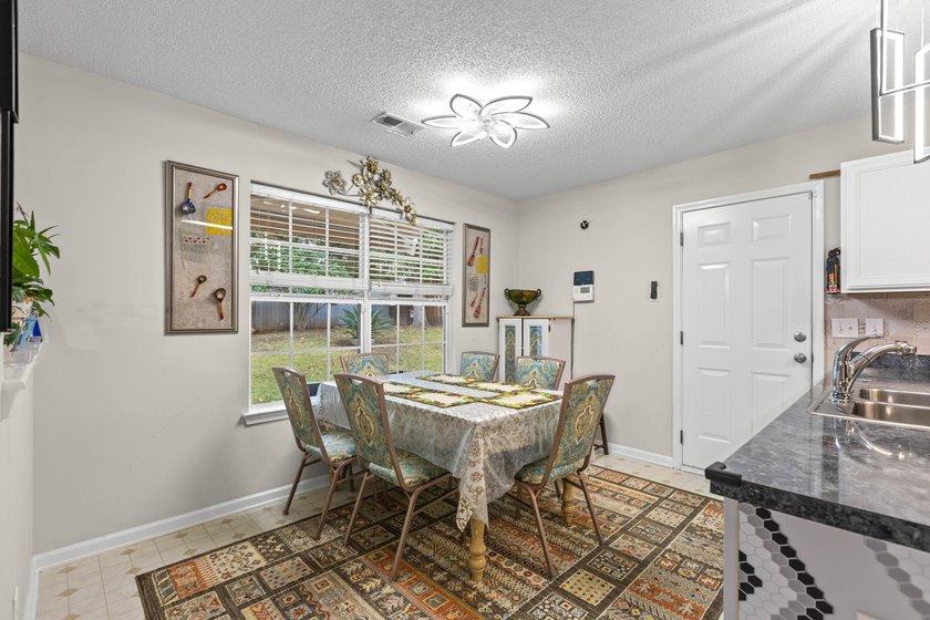 Spacious 4BR/2.5BA home in Park Hill Place offering nearly 2,400 - photo 4