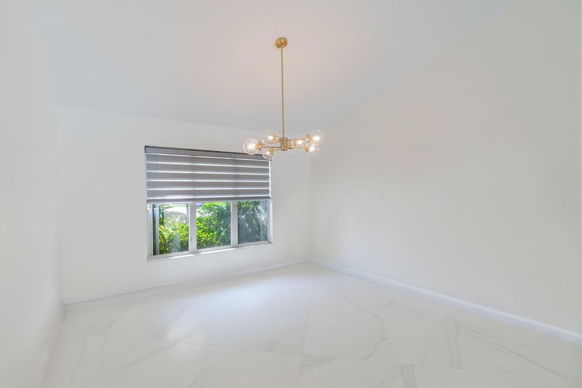 Gracefully situated on a quiet cul-de-sac within the exclusive - photo 11