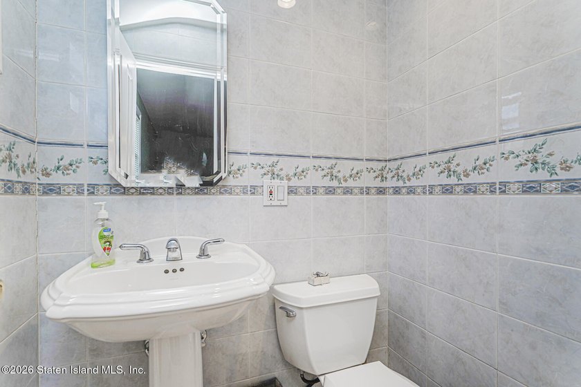 Welcome to 201 Arlene Street! This spacious 2-family, high-ranch - photo 12