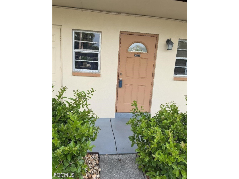 This Gulf Access Condo is located in a beautiful setting - photo 2